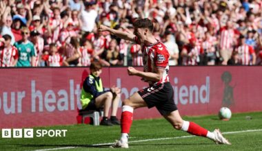 Trai Hume of Sunderland celebrates scoring his team's first goal against Chelsea