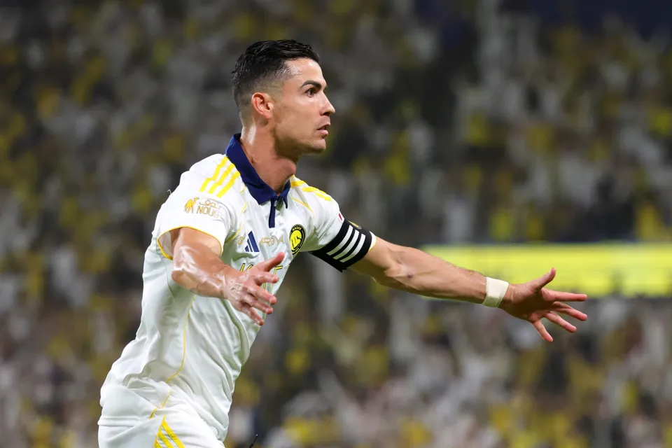Cristiano Ronaldo of Al Nassr celebrates scoring his team's third goal during the Saudi Pro League match between Al Nassr and Damac