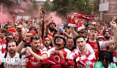 Arsenal victory parade: Thousands of fans line streets of north London