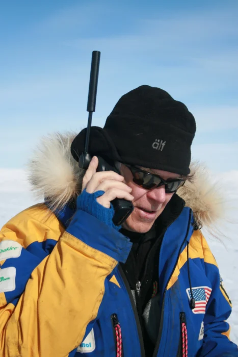 Veteran polar traveller Will Steger using a satellite phone on a previous expedition