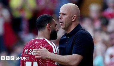 Arne Slot gives Mohamed Salah a pat on the back