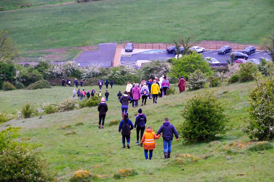 Walkers on the way down the hill. Photo: David Knight