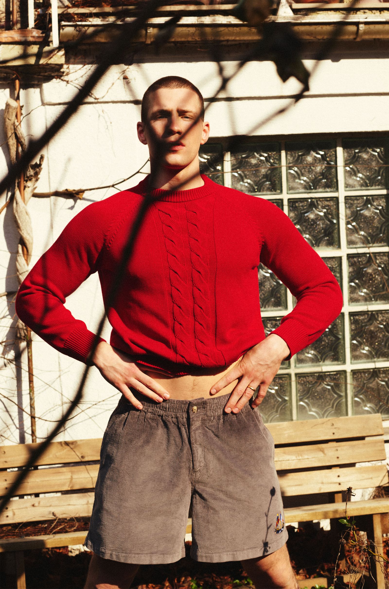 Image may contain Clothing Knitwear Sweater Adult Person Face and Head