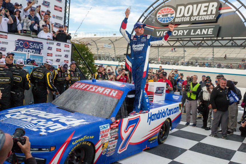 Kyle Busch celebrates after winning the Truck Series race in Dover, Delaware, on May 15.