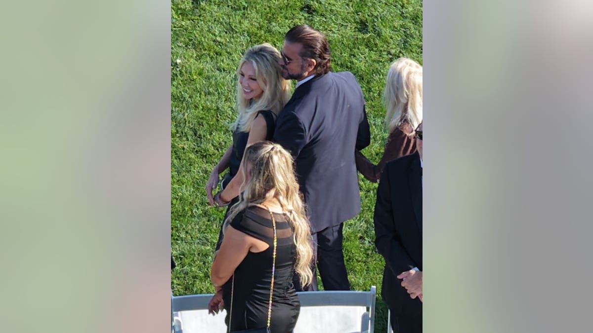 Heather Locklear and Richie Sambora walking at a wedding venue in Montecito, California