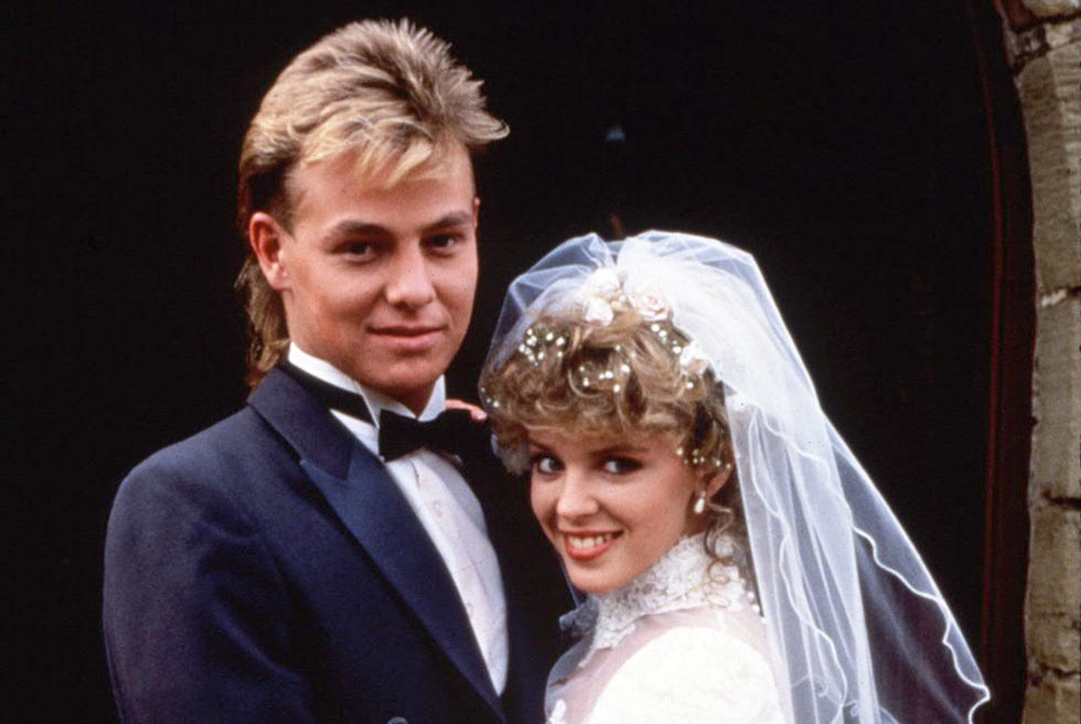 Jason Donovan as Scott, Kylie Minogue as Charlene, Neighbours 1988 jason donovan as scott, kylie minogue as charlene on their wedding day in neighbours 1988