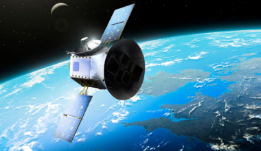 A NASA satellite launched in 1976 carries a Carl Sagan–designed plaque sealed inside its core, mapping Earth's continents 268 million years ago, at launch, and 8.4 million years from now — and that last date is no accident, because it's roughly when the satellite is expected to fall back to Earth and finally be opened.