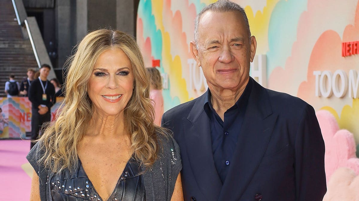 Rita Wilson and Tom Hanks standing together at the Barbican Centre in London