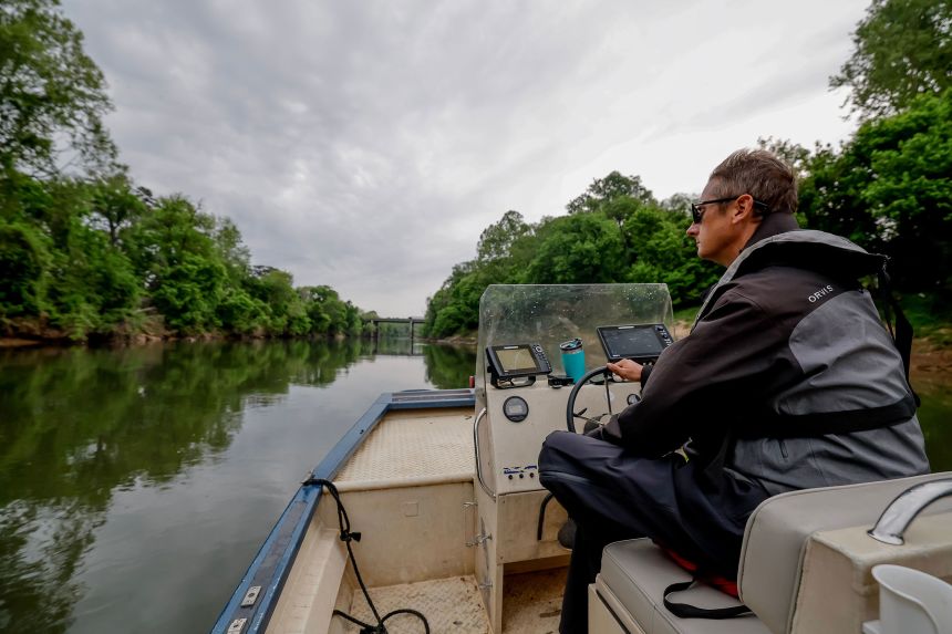 Jason Ulseth gives a boat tour of the Chattahoochee River in Atlanta in April 2025.
