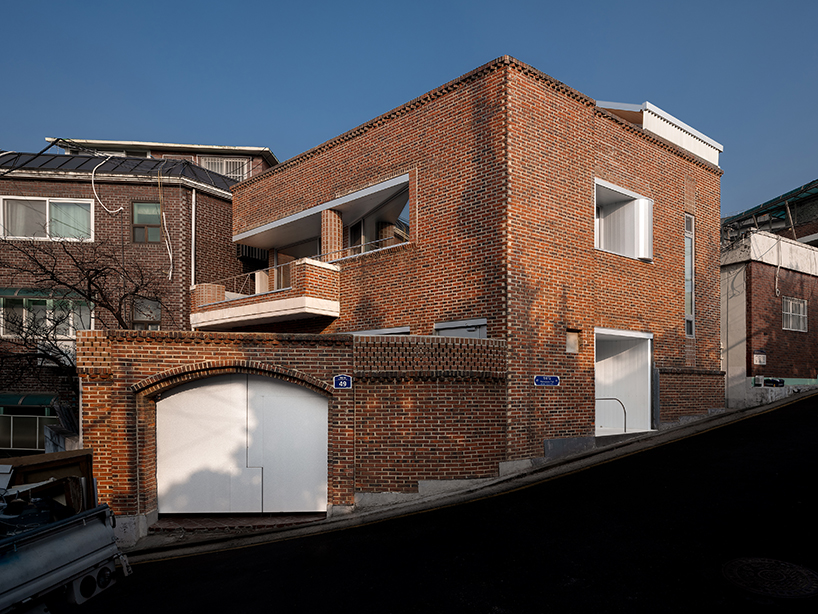 red brick and zinc reshape a 1970s house in seoul into a hybrid studio-home - 1