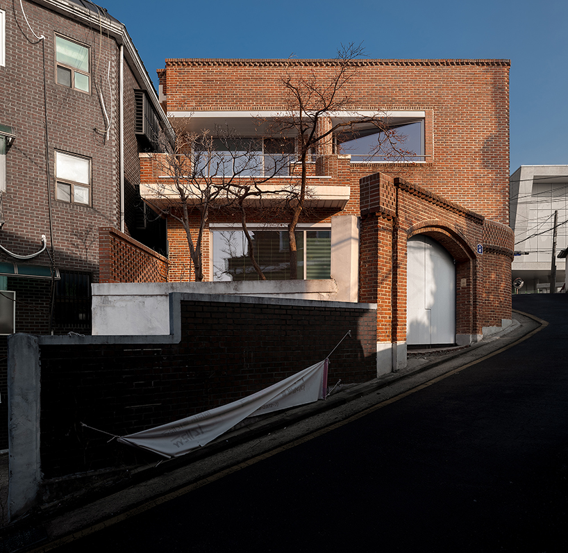 red brick and zinc reshape a 1970s house in seoul into a hybrid studio-home - 2