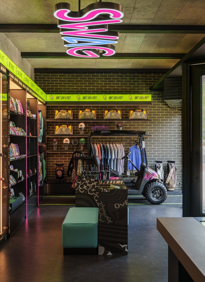 monochrome surfaces and neon accents outline swag golf bangkok flagship - 9