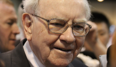 Warren Buffett smiling.
