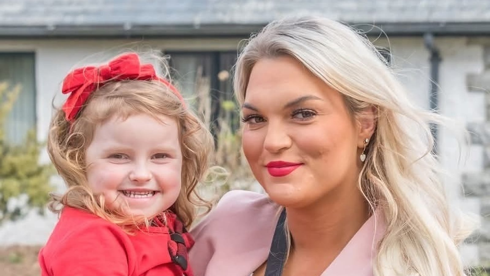 Man charged over road crash in which woman, child killed