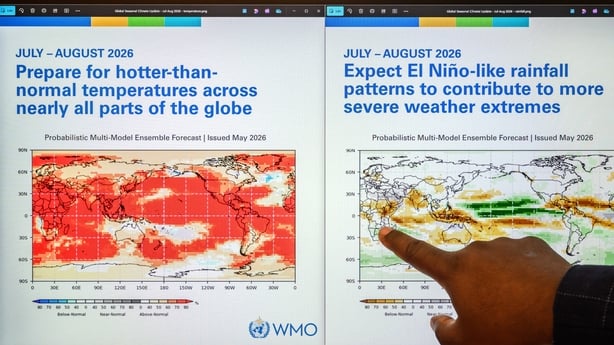 A finger points at a display depicting el nino weather patterns 