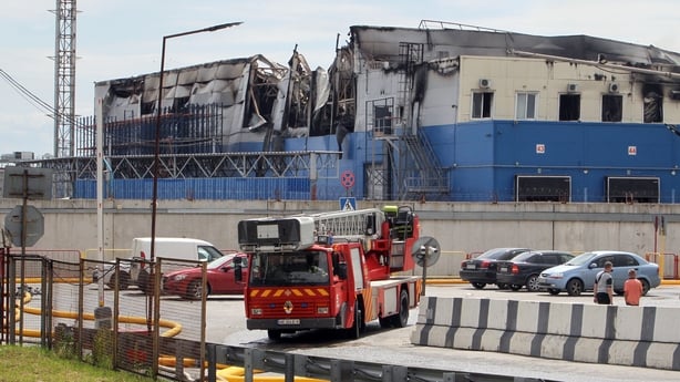 A fire engine is outside a distribution center in the village of Slobozhanske in the Dnipropetrovsk region in Ukraine.