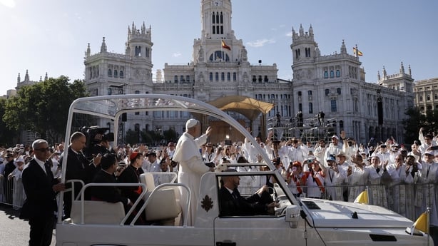  Pope Leo XIV waves from the popemobile as he arrives to lead the Holy Mass in the Plaza de Cibeles in Madrid