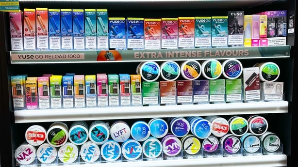 Nicotine Pouch packaging on display alongside vapes