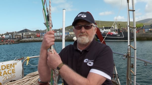 Pat Lawless standing on the deck of his yacht