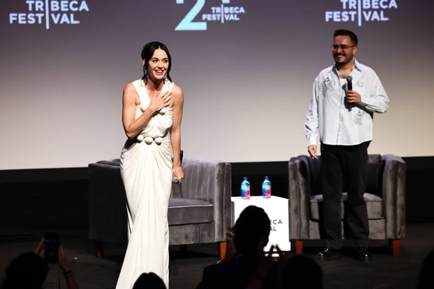NEW YORK, NEW YORK - JUNE 08: (L-R) Katy Perry and Tomás Mier speak onstage during