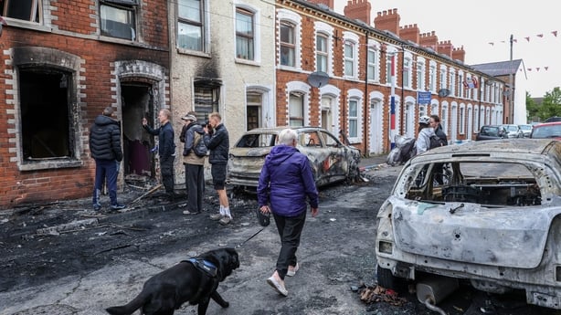 Burnt-out cars and homes after disorder in eastern Belfast, Northern Ireland
