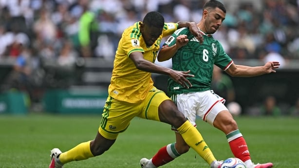 South Africa's midfielder #13 Sphephelo Sithole and Mexico's midfielder #06 Erik Lira fight for the ball during the 2026 World Cup Group A football match between Mexico and South Africa at the Mexico City Stadium in Mexico City on June 11, 2026.