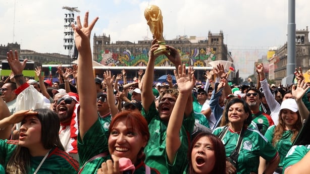 Mexican fans cheer for their team