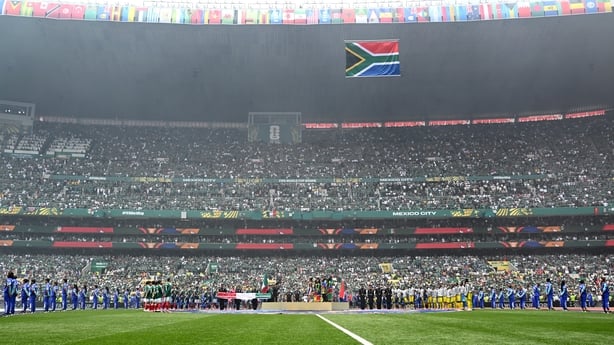General view inside the stadium as players of both teams line up for the national anthems