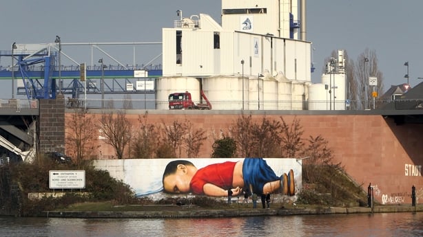 A graffiti depicts the drowned Syrian refugee boy Aylan Kurdi