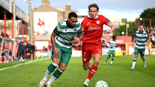 12 June 2026; Jake Mulraney of Shamrock Rovers in action against Harry Wood of Shelbourne the SSE Airtricity Men's Premier Division match between Shelbourne and Shamrock Rovers at Tolka Park in Dublin. Photo by Paul Phelan/Sportsfile