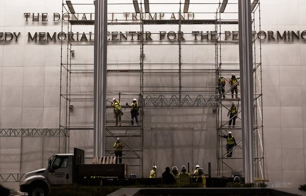 WASHINGTON, DC - June 12: Workers continue to put up scaffolding prior to the removal of President Donald Trump's name from the Kennedy Center on June 12, 2026 in Washington, DC.(Photo by Craig Hudson for The Washington Post via Getty Images)