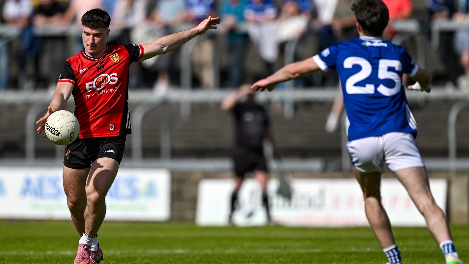 Down run up score on Laois to ease into Tailteann semis