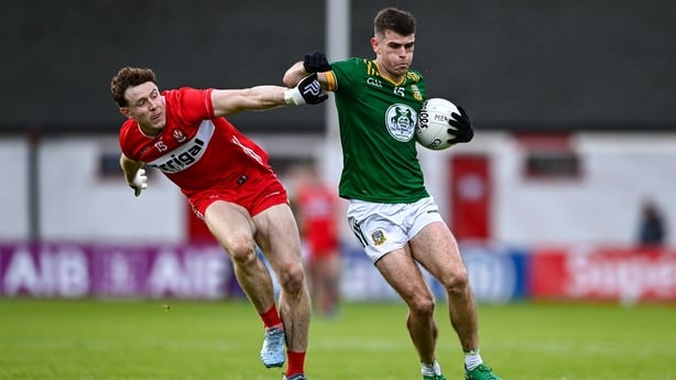 13 June 2026; Eoghan Frayne of Meath is tackled by Lachlan Murray of Derry during the GAA Football All-Ireland Senior Championship Round 2B match between Derry and Meath at Find Insurance Celtic Park in Derry. Photo by Ben McShane/Sportsfile