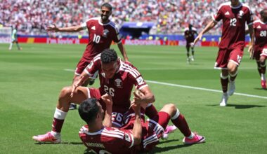Qatar stun Switzerland with injury-time equaliser