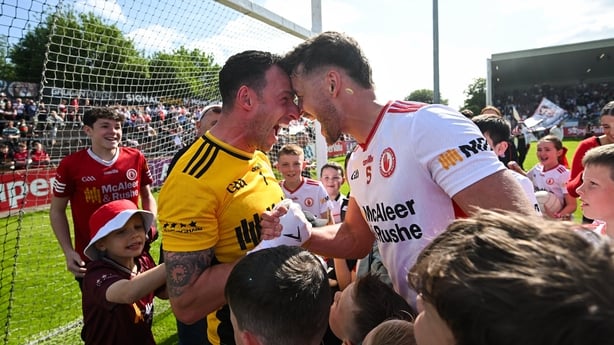 Tyrone players Niall Morgan, left, and Michael McKernan celebrate after win over Mayo in 2026 All-Ireland SFC