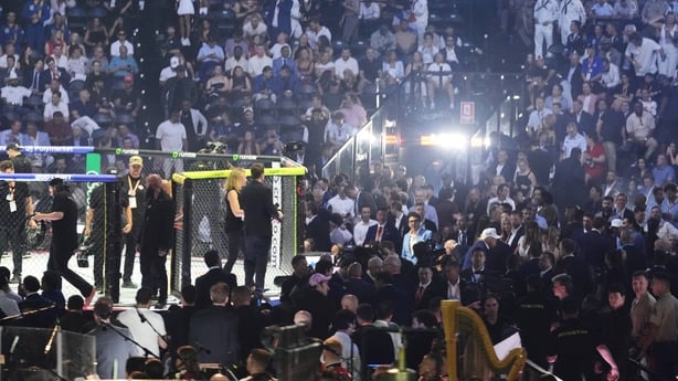 US President Donald Trump, in the lower right wearing a white hat, attends UFC Freedom 250 on the South Lawn of the White House, in Washington, DC, on June 15, 2026. (Photo by Jacquelyn Martin / POOL / AFP)