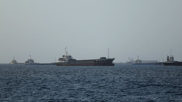 GULF OF OMAN - JUNE 17: Commercial vessels and oil tankers preparing to transit through the Strait of Hormuz, one of the most critical strategic waterways for global trade flows, maintain their wait in the Gulf of Oman, on June 17, 2026. The strait, which had been closed for months due to the US-Ira