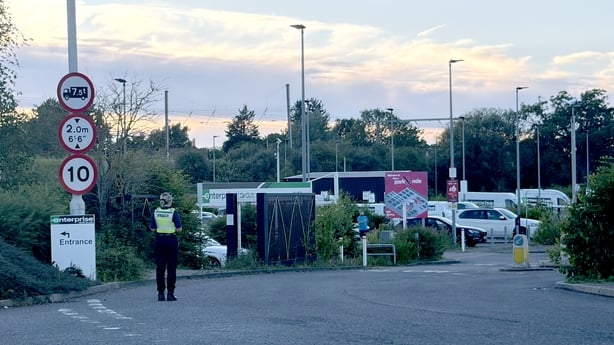 Police at Progress Park in Bedford, where families will pick up loved ones who were traveling on trains which collided in UK