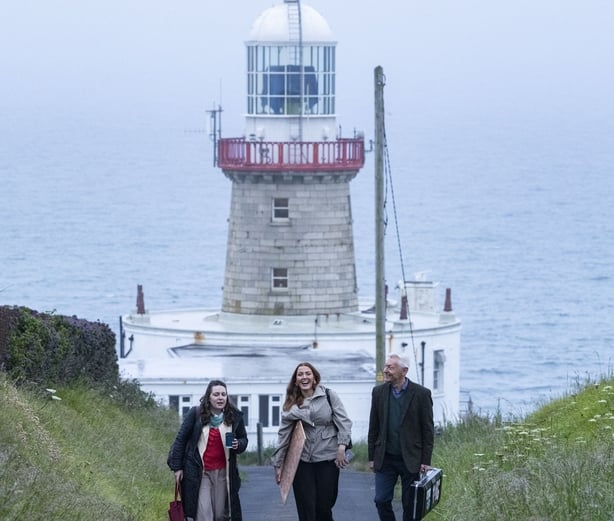 Musicians leaving Baily Lighthouse after recording Céilí House