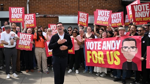 Labour party candidate Andy Burnham addresses supporters outside the Labour party campaign office in Ashton in Makerfield, northwest England, on June 18, 2026, as voters go to the polls to vote in the Makerfield by-election. Britain holds a unique vote on June 18 that could trigger the endgame for L
