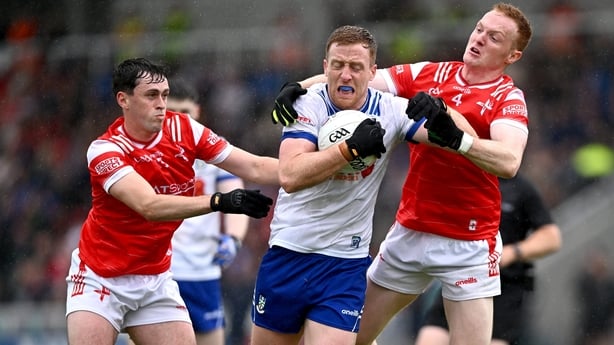 24 May 2025; Kieran Duffy of Monaghan in action against Kieran McArdle, left, and Donal McKenny of Louth during the GAA Football All-Ireland Senior Championship Round 1 match between Louth and Monaghan at Cedral St Conleth's in Newbridge, Kildare. Photo by Piaras Ó Mídheach/Sportsfile