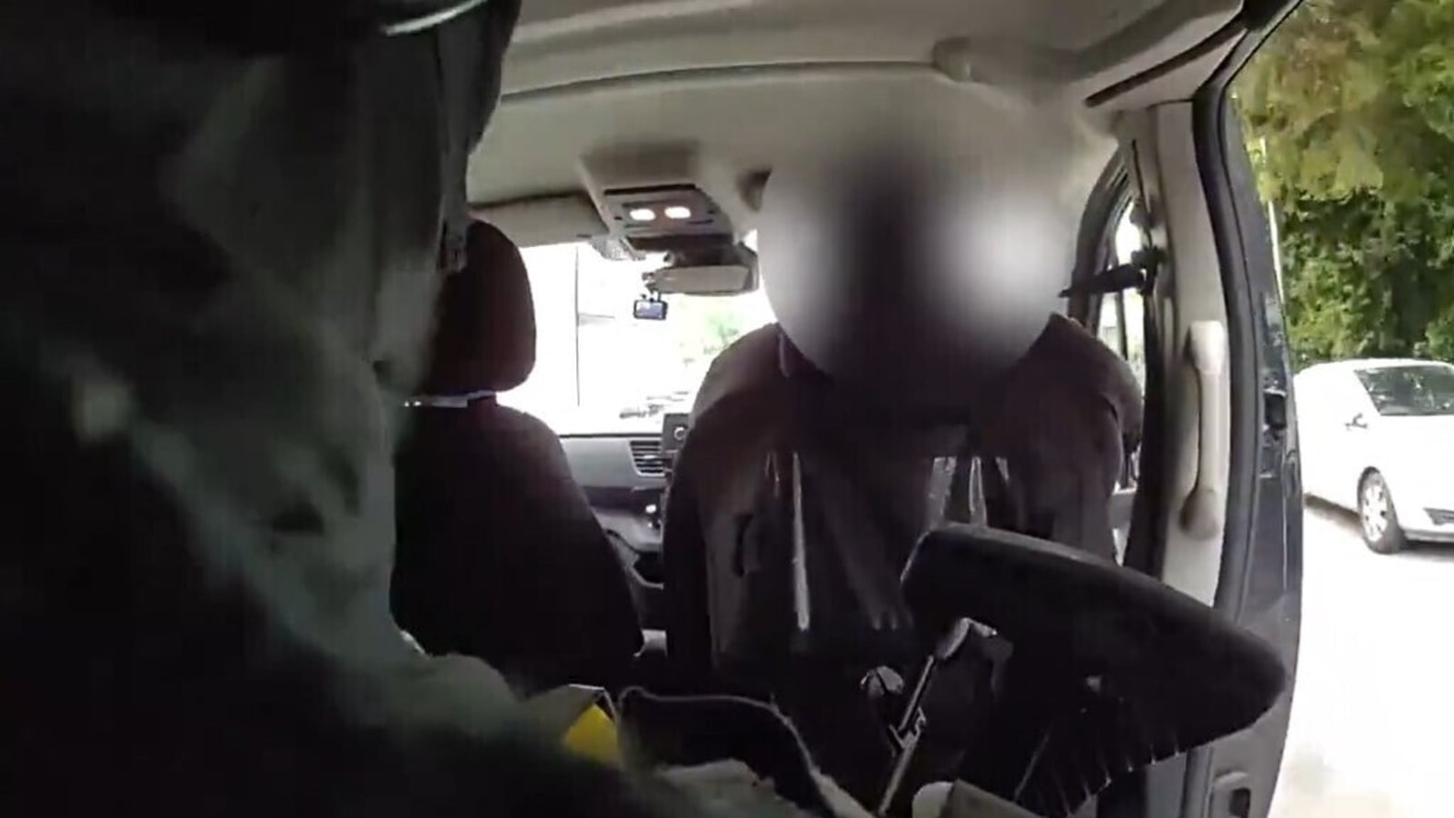UK van driver gives lift to armed police chasing suspect