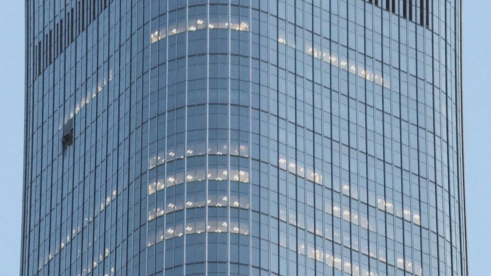 Small aircraft crashes into Beijing's tallest building