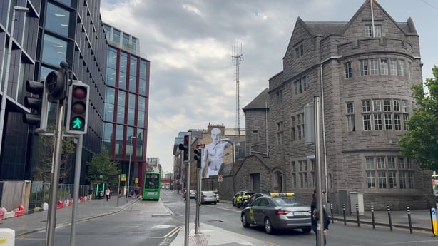 Townsend street in Dublin, featuring a mural of a trans man created by artist Joe Caslin