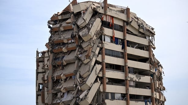 A view shows a heavily damaged apartment building following an earthquake in Catia La Mar, La Guaira