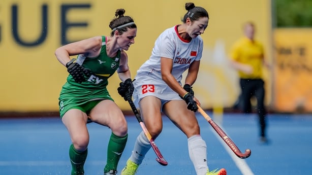 Yunxia Fan Player of China is put under pressure by Roisin Upton Player of Ireland