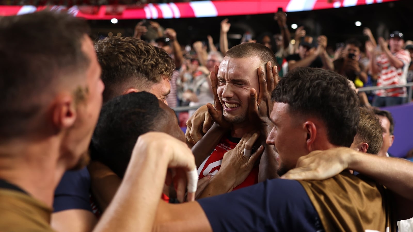 Austria and Algeria advance after ridiculous finale