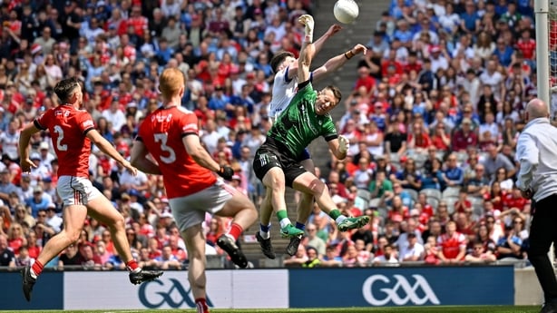 28 June 2026; Stephen O'Hanlon of Monaghan scores his side's second goal despite the efforts of Louth goalkeeper Niall McDonnell during the GAA Football All-Ireland Senior Championship quarter-final match between Louth and Monaghan at Croke Park in Dublin. Photo by Sam Barnes/Sportsfile