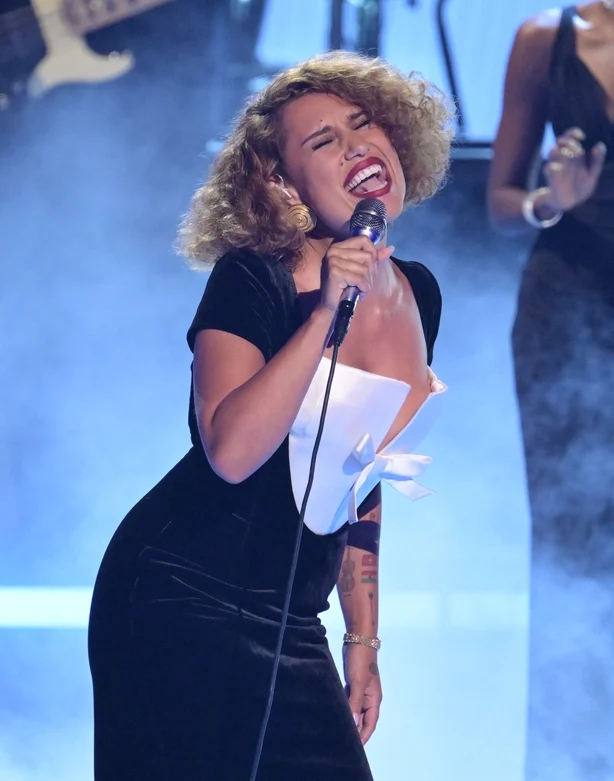 Raye performs onstage at the BET Awards 2026