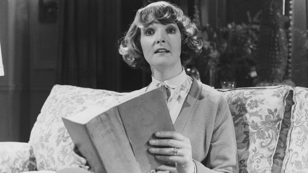 "Actress Penelope Keith reading a book in a scene from episode 'All New Together' of the television sitcom 'To the Manor Born', 